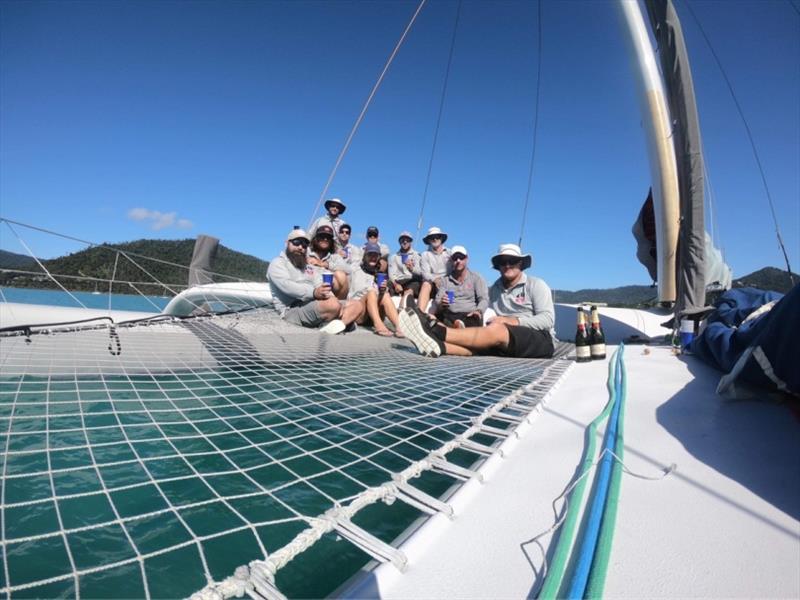 ORMA 60 crew - French champagne to celebrate the win - 2020 Airlie Beach Race Week, final day photo copyright ORMA 60 taken at Whitsunday Sailing Club and featuring the ORMA 60 class