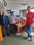 Tony Oliver presenting helm Terry Curtis and crew Peter Greig with their silverware during the Osprey Panmorra Cup at Mount's Bay Sailing Club © Kevin Francis