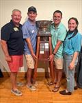 Mini Max team with the Philadelphia Cup Perpetual trophy (l-r) Matthew York, Zach York, Merlin Suggs and Skye Miller at the Philadelphia Cup Regatta 2026 &copy; Brielle Weinstein