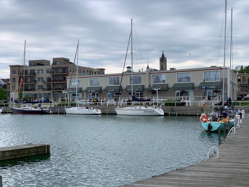 Finishing boats begin to arrive at Port Washington photo copyright Phil Bush taken at  and featuring the PHRF class