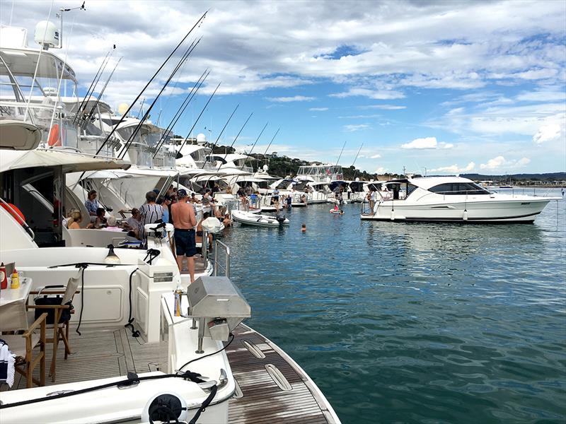 Relaxing in the afternoon sunshine after a successful raft-up. - photo © Riviera