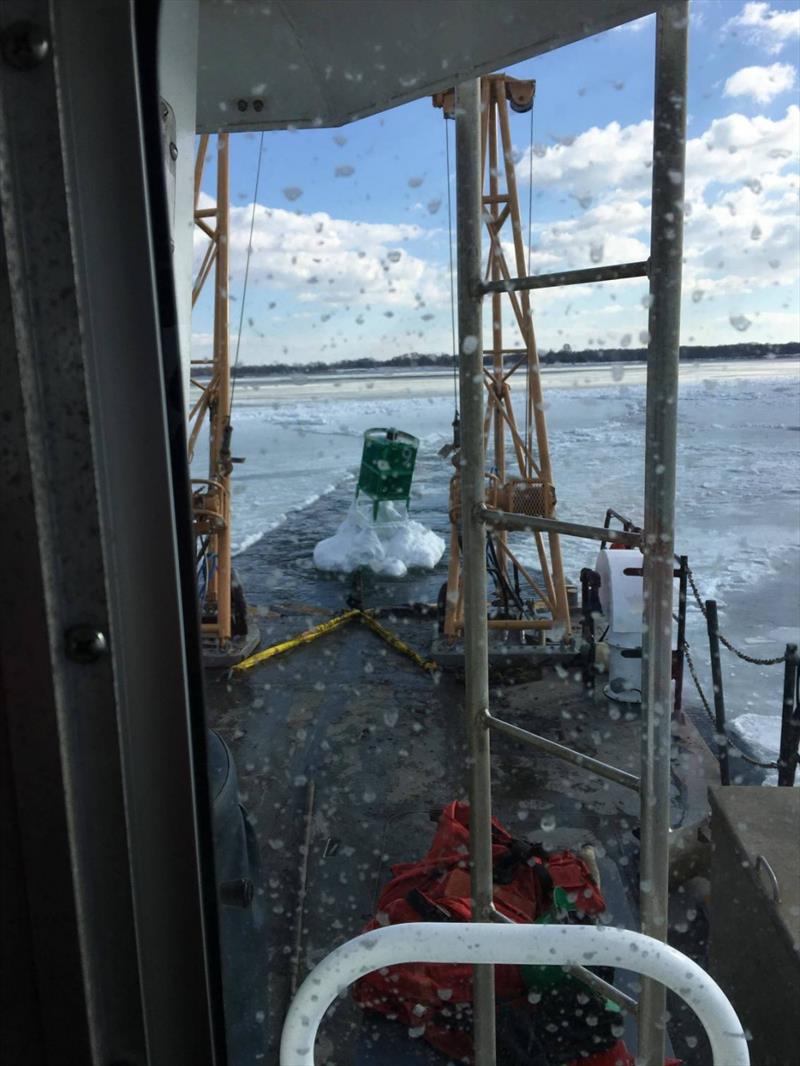 Coast Guard Aids to Navigation Team Bristol tows a buoy back to its proper position using a Buoy Utility Stern Loading (BUSL) boat, Tuesday, Jan. 9, 2018, in the Providence River. The buoy was knocked off station by ice  photo copyright U.S. Coast Guar taken at  and featuring the Power boat class