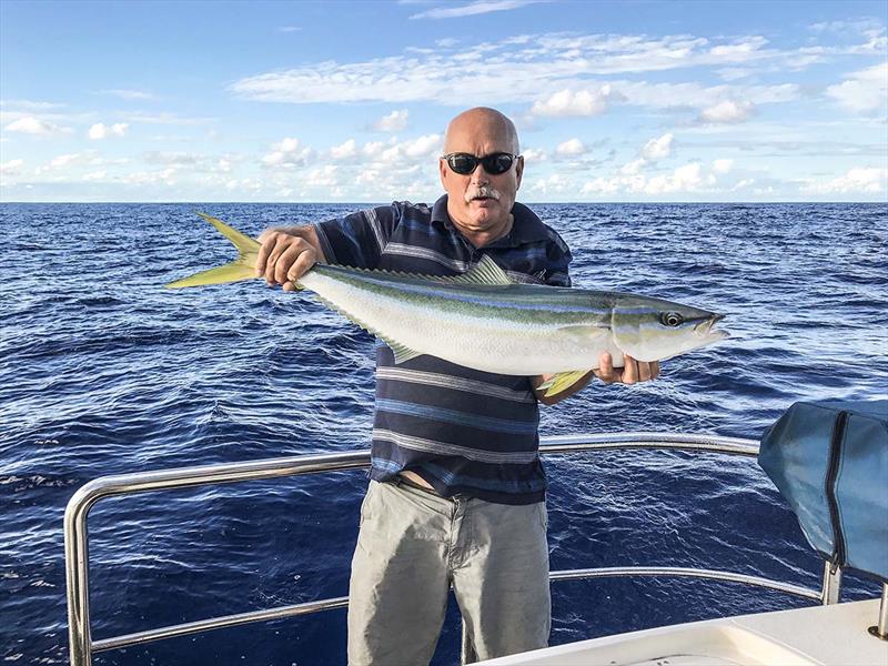 Mark Slocombe displays another winning catch photo copyright Riviera Australia taken at  and featuring the Power boat class