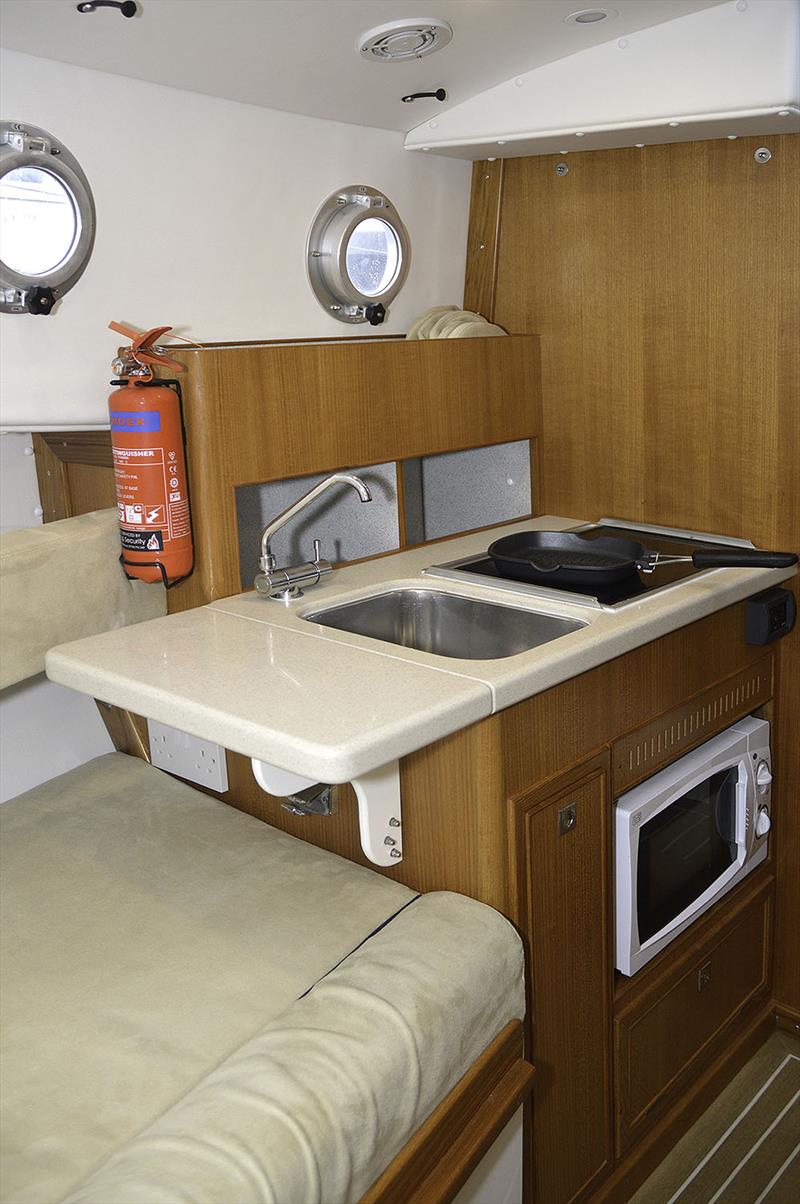 Standard  'no-gas' galley arrangement with diesel-fired hob and microwave fitted as standard. There is an option to have the galley in the wheelhouse photo copyright Barry Pickthall / PPL taken at  and featuring the Power boat class