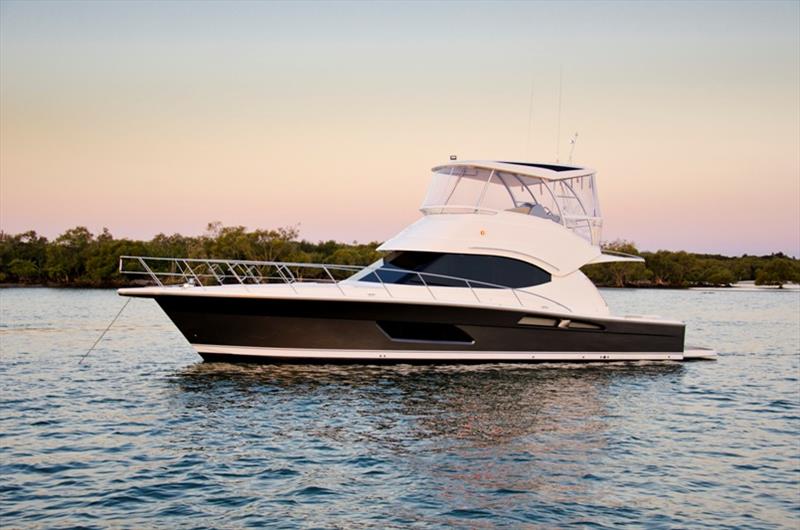 The blue-water Riviera 45 Open Flybridge at anchor photo copyright Riviera Australia taken at  and featuring the Power boat class