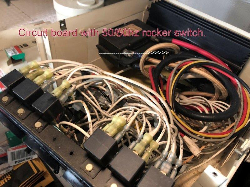 50/60Hz rocker switch on a control board behind these wires - photo © Pendana Blog, www.pendanablog.com
