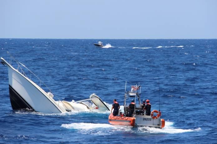 A Coast Guard Cutter Robert Yered small boat crew arrives on scene with the sinking vessel La Bella on Saturday, April 28, 2018 approximately 13 miles northwest of Cat Cays, Bahamas. - photo © Petty Officer 2nd Class Kyle Galan