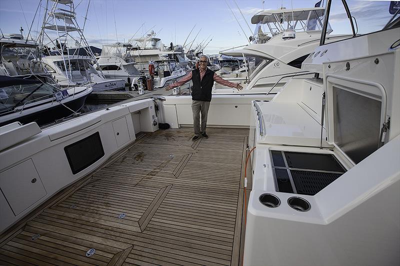 Stephen Milne, Riviera's Brand & Communications Director, in the expansive cockpit of the 72 Sports Motor Yacht photo copyright John Curnow taken at  and featuring the Power boat class