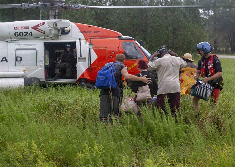 An MH-60T Jayhawk Helicopter crew from Coast Guard Air Station Elizabeth City, North Carolina, evacuates residents from Rocky Point, North Carolina due to flooding caused by Hurricane Florence photo copyright Petty Officer 2nd Class Dustin Williams U.S. Coast Guard District 5 taken at  and featuring the Power boat class
