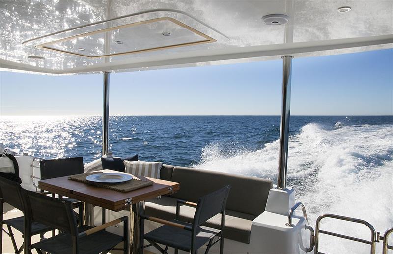 Out aft on the ILIAD 50, and it is almost within arm's reach of the galley, where there is also a breakfast bar photo copyright Jennifer McKinnon taken at  and featuring the Power boat class