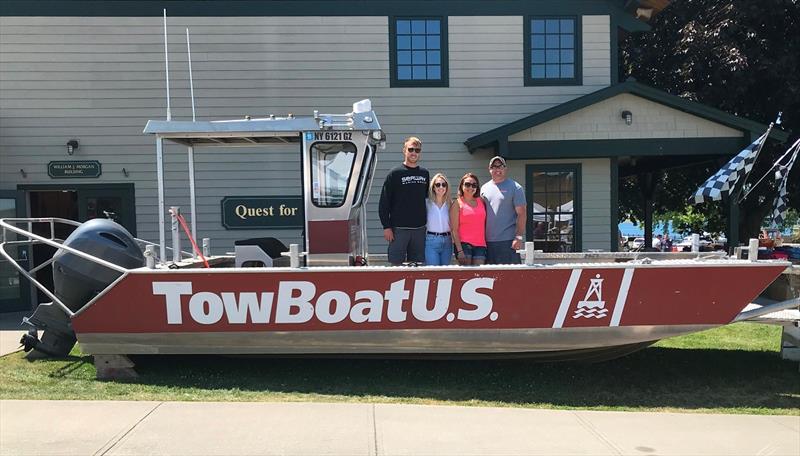 (R to L) Capt. Grant Langheinrich and Karla Langheinrich with Jennifer Van Reenen and Capt. Jake Van Reenen aboard TowBoatUS Clayton's response vessel at the recent 55th Annual Antique Boat Show & Auction in Clayton, NY photo copyright Scott Croft taken at  and featuring the Power boat class