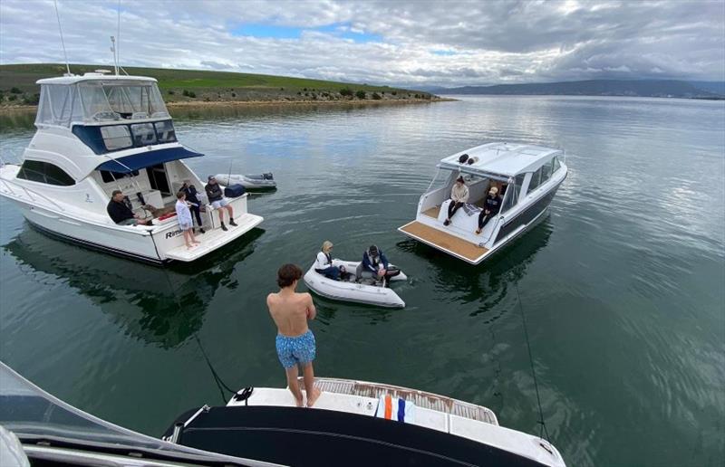 Being able to see and talk to friends from afar from their boat has helped the Tappings cope well with isolation - photo © Riviera Australia