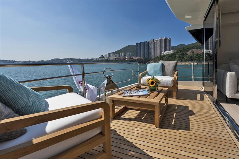 Monte Carlo Yacht 70 Skylounge photo copyright Asia Yachting taken at  and featuring the Power boat class