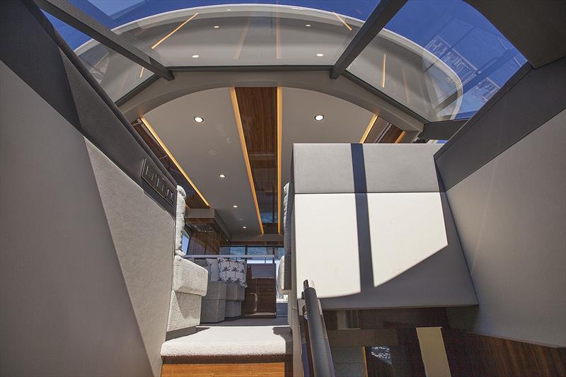 Atrium style access to lower deck is simply brilliant - New Maritimo M55 photo copyright John Curnow taken at  and featuring the Power boat class