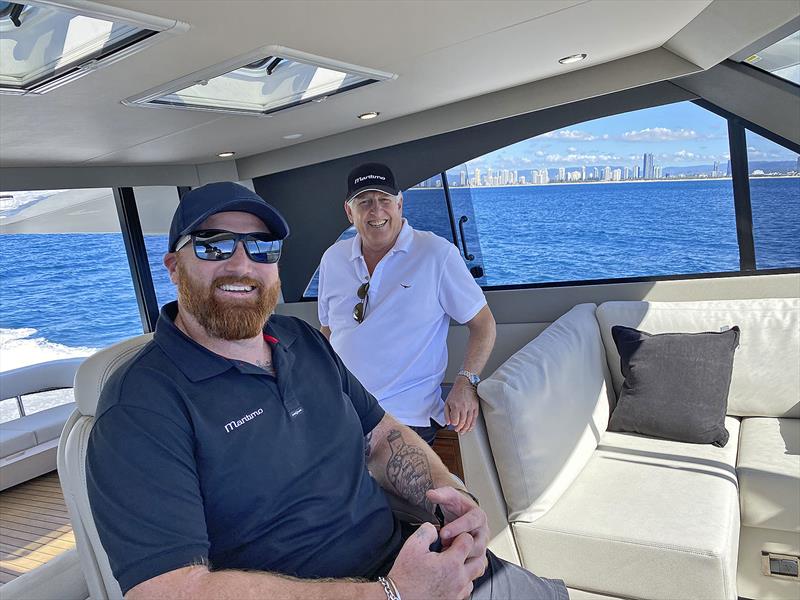 Look Mum. No Hands! Driving away and a quick chance to snap Maritimo's Isaac Marshall and Paul Wilson, as we highlight the brilliant vista windows - New Maritimo M55 photo copyright John Curnow taken at  and featuring the Power boat class