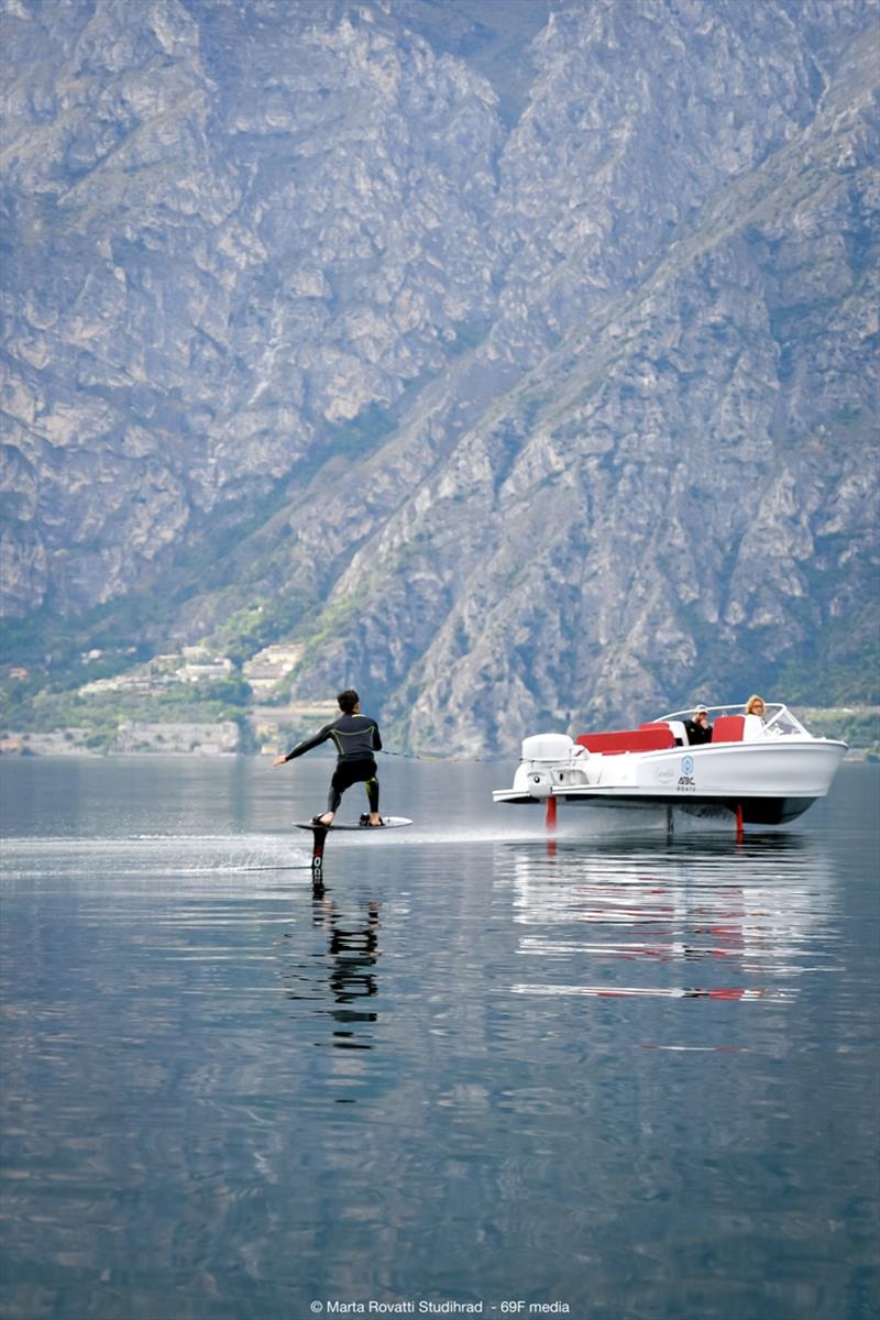 A Candela C-7 towing a foiling surfboard - probably the most energy-efficient watersport combo ever photo copyright Pierre Mangez taken at  and featuring the Power boat class