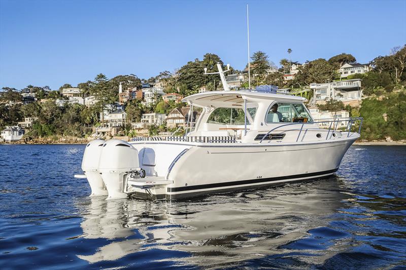 Classically styled, outboard powered - Back Cove 34O - photo © E Marine