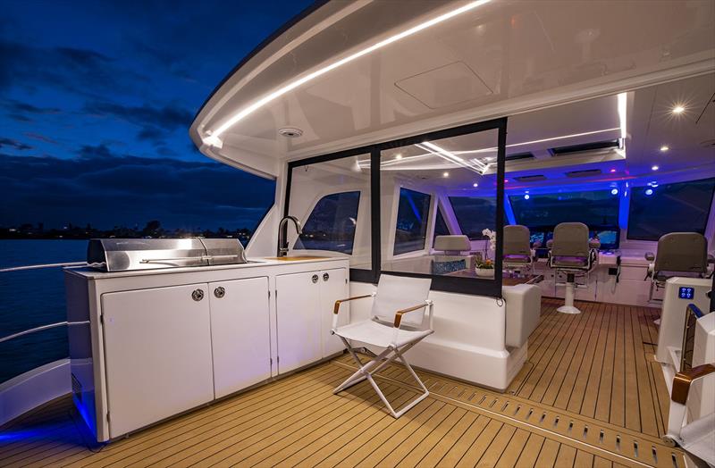 Sky lounge of the Aquila 70 offers the complete al fresco experience - photo © Onne van der Wal