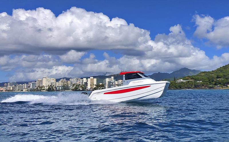 Aquila Molokai Cat 28 - bow out - only way to run. - photo © Aquila Boats