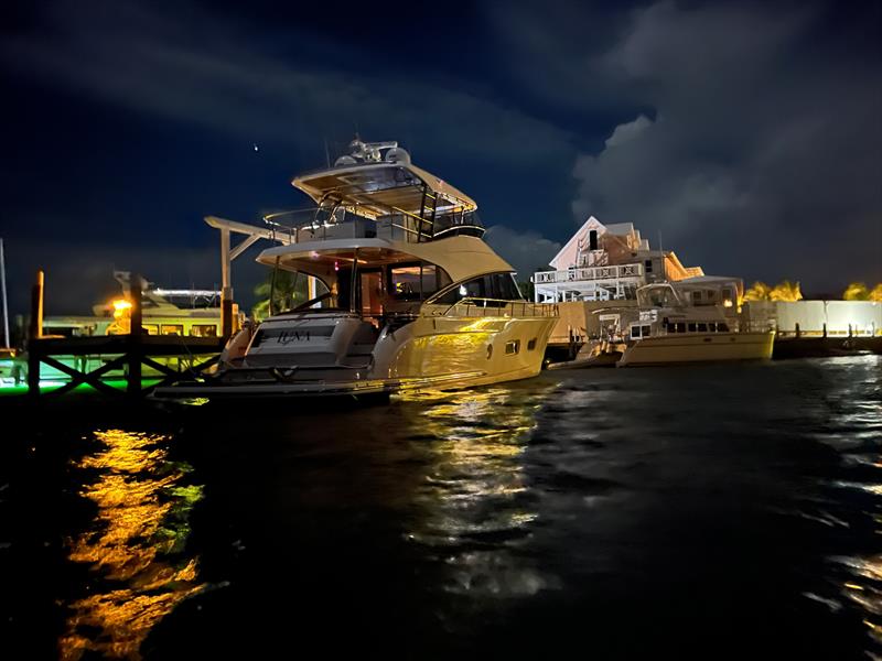 Night-time silhouettes of Luna, a motor yacht that accommodates the Surkovics, their family and friends in comfort and luxury photo copyright Riviera Australia taken at  and featuring the Power boat class