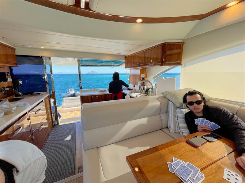 Lance and Caroline Merker, and their son Kyle, love spending time on board, either relaxing or preparing the day's catch for the evening meal. - photo © Riviera Australia