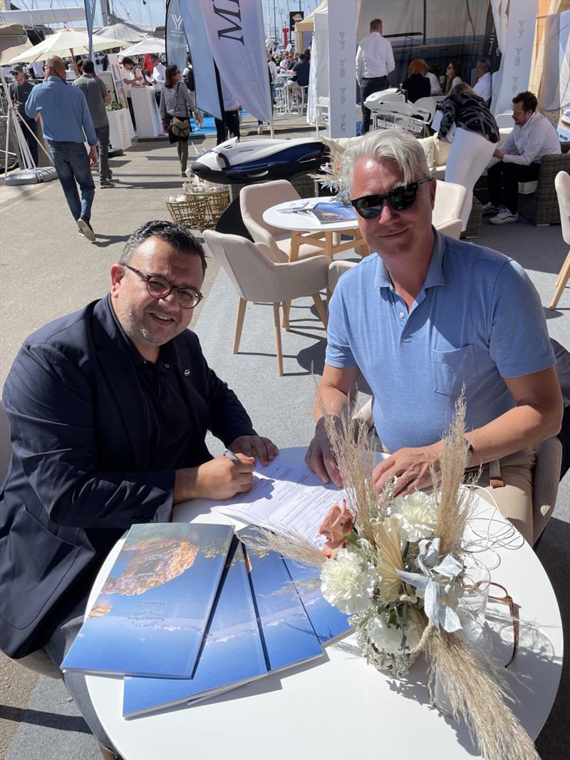 CEO Willem Steenkamer signing an agreement with Charlo Briffa from the Sunseeker Malta - Palma International Boat Show photo copyright Emilis Remeikis taken at  and featuring the Power boat class