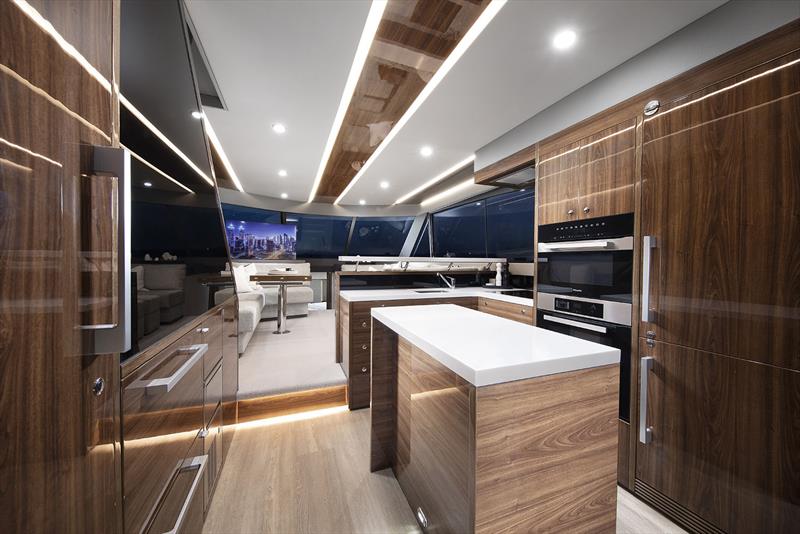 Cooking and connection - the galley is both a masterpiece and centrepiece on the Maritimo M600 Offshore FMY - photo © Maritimo