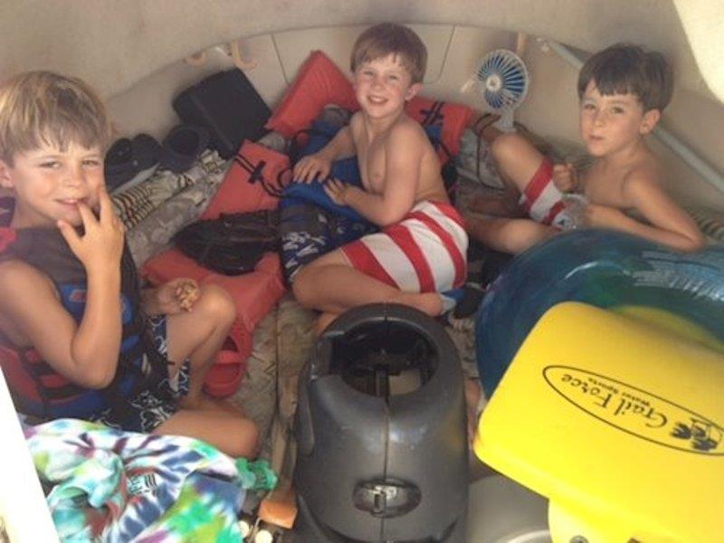 Snack time, nap time, and fort building are just some of the moments the boys enjoyed below deck on the Seafarer 226. Pictured left to right:  Alex, Jack, Bowen photo copyright Grady-White taken at  and featuring the Power boat class