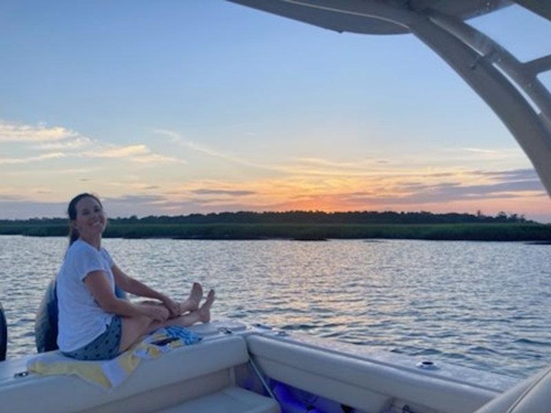 Danielle enjoys a sunset on the family's Freedom 275 photo copyright Grady-White taken at  and featuring the Power boat class