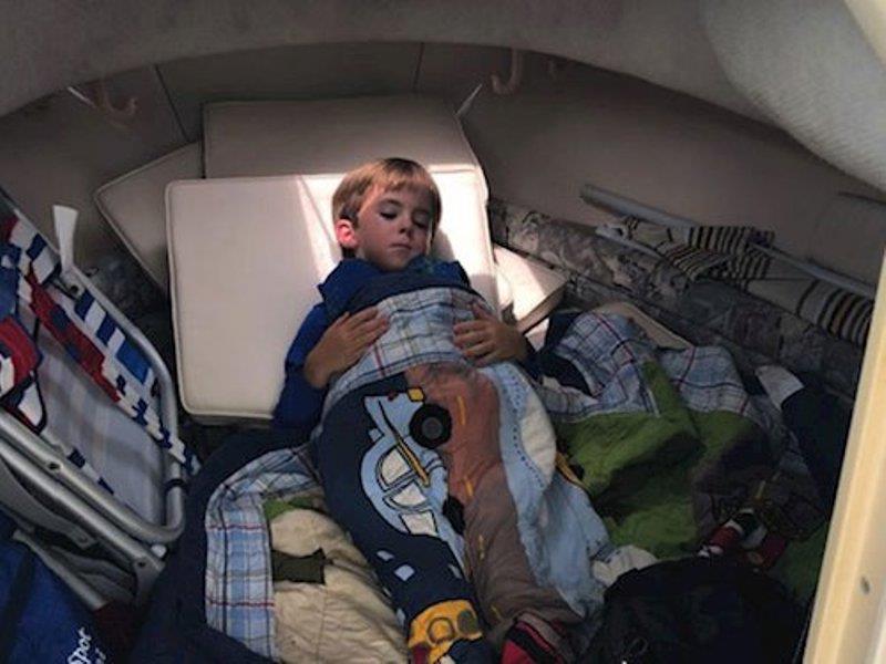 The Troutman boys loved napping in the cabin of their Seafarer 226! On this rare occasion, Henry slept soundly with the cabin all to himself photo copyright Grady-White taken at  and featuring the Power boat class