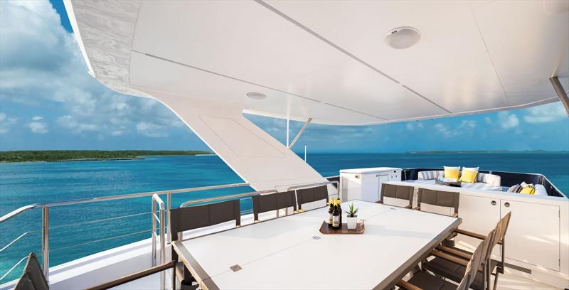 Tri-deck FD100 Hull 7 - Uppermost deck - Expandable dining table photo copyright Horizon Yachts taken at  and featuring the Power boat class