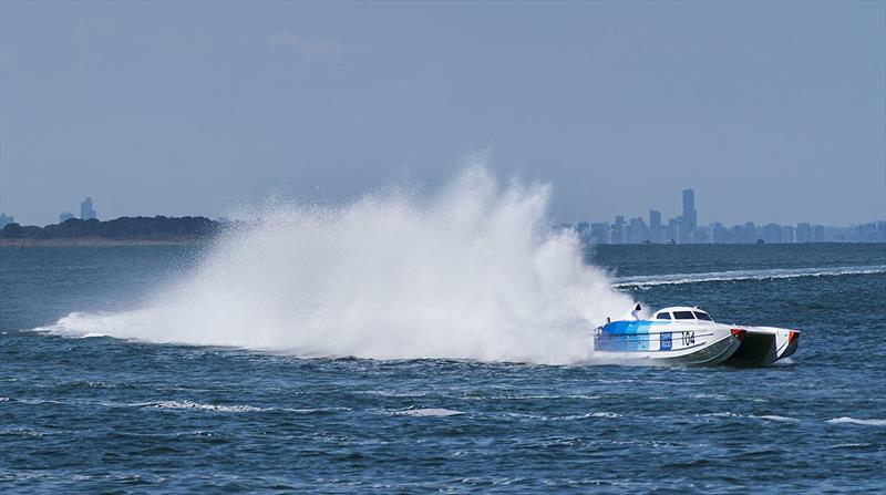 The highly visible rooster tail caused by the surface piercing drives of  the Class One boats - Offshore Superboat Championship