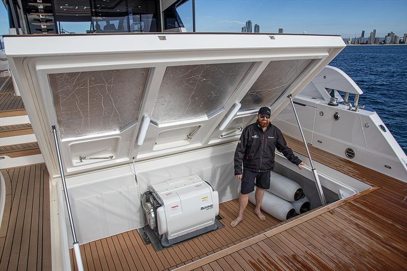 Isaac Marshall in the massive lazarette on board the new Maritimo S75 - photo © John Curnow