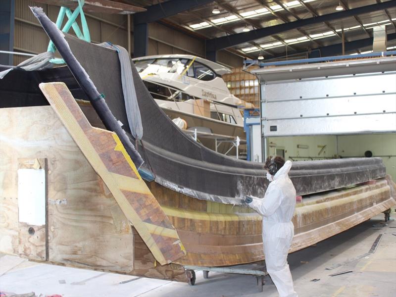 Isaac trimming B73's wave splitter - B73 photo copyright Lloyd Stevenson Boatbuilders taken at  and featuring the Power boat class