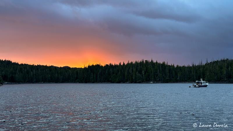 Ithaka with gorgeous sunset glow, Blunden Harbour photo copyright Laura Domela taken at  and featuring the Power boat class