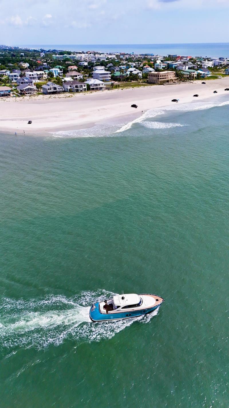 St.Augustine with pick up trucks on the beach, enjoying a pick-nick - photo © Zeelander Yachts 
