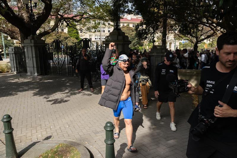 Jono Ridler enters Parliament grounds after completing his 1367km swim - Wellington - April 4, 2026 - photo © Joshua Mccormack/LiveOcean