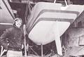 Paul Whiting alongside Magic Bus which he designed, built and raced to win the Quarter Ton Cup