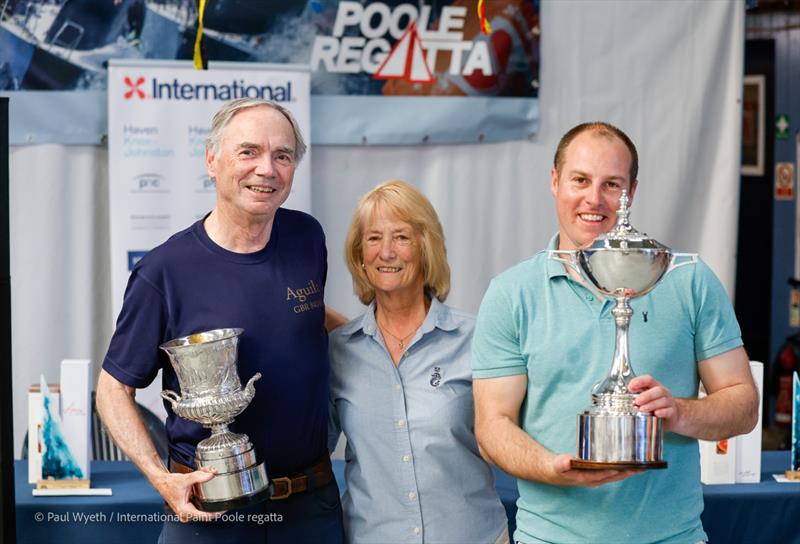 A trophy haul for Aguila, including the Canford Cup, at the International Paint Poole Regatta 2026 Prize Giving photo copyright Paul Wyeth / www.pwpictures.com taken at Royal Motor Yacht Club, England and featuring the Quarter Tonner class