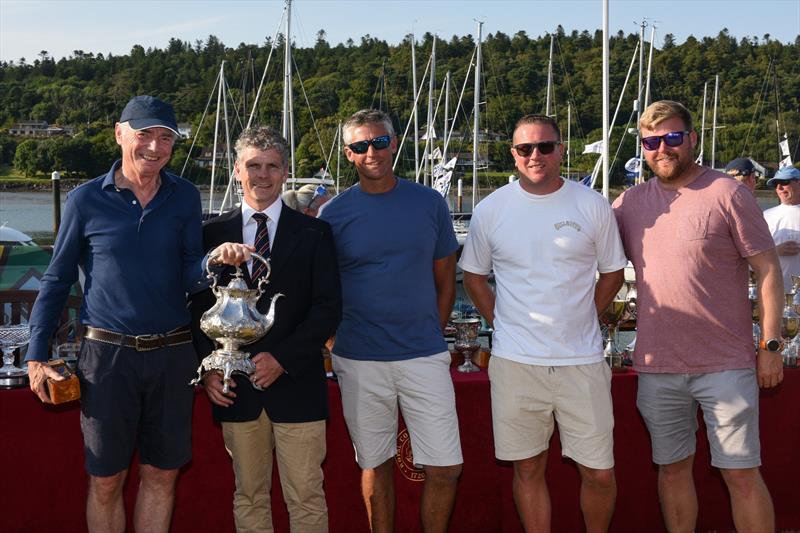 Cork Week 2026 - Cork Week Chairman Ross Deasy awards the Kinsale Kettle to Sam Laidlaw's BLT photo copyright Rick Tomlinson / RCYC taken at Royal Cork Yacht Club and featuring the Quarter Tonner class
