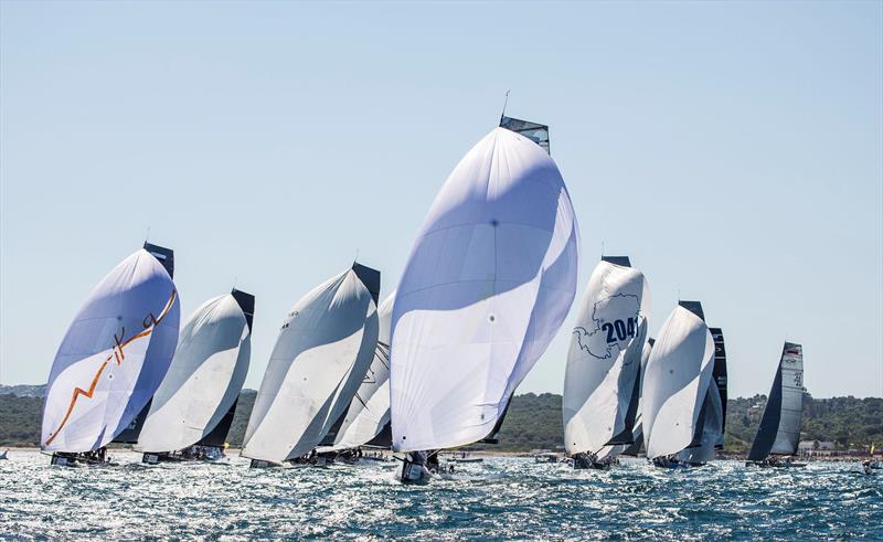Fleet racing in Sotogrande at the RC44 Puerto Sotogrande Cup photo copyright Nico Martinez / MartinezStudio taken at  and featuring the RC44 class