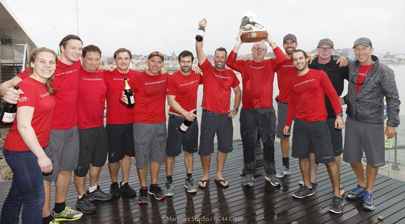 Nico Poons (with trophy) and his Charisma crew, post dowsing with victor's champagne at the RC44 Cascais Cup photo copyright Nico Martinez / www.MartinezStudio.es taken at Clube Naval de Cascais and featuring the RC44 class