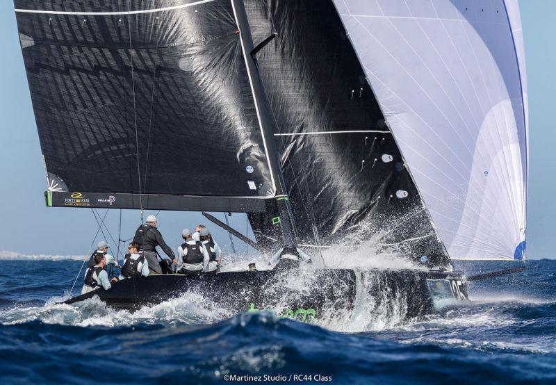 Team Aqua blasts downwind during the RC44 Calero Marinas Cup in Lanzarote photo copyright Nico Martinez / MartinezStudio taken at  and featuring the RC44 class