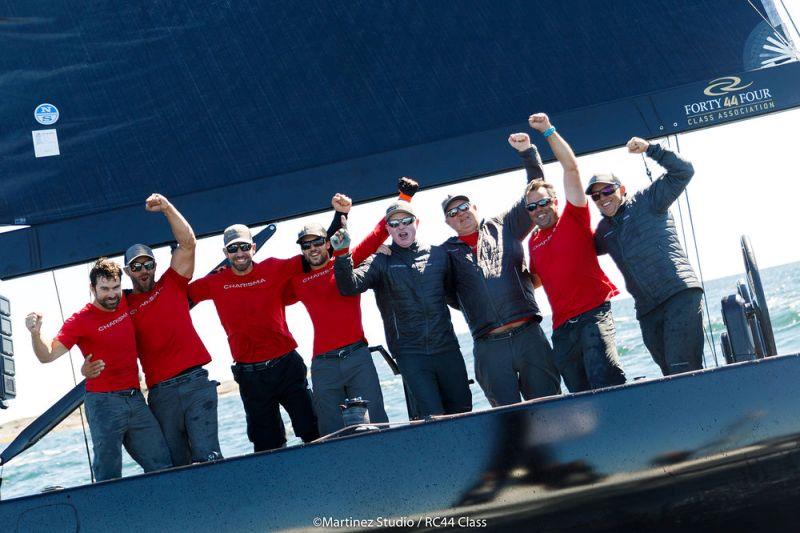 Charisma celebrate their win on the water photo copyright Nico Martinez / MartinezStudio taken at  and featuring the RC44 class