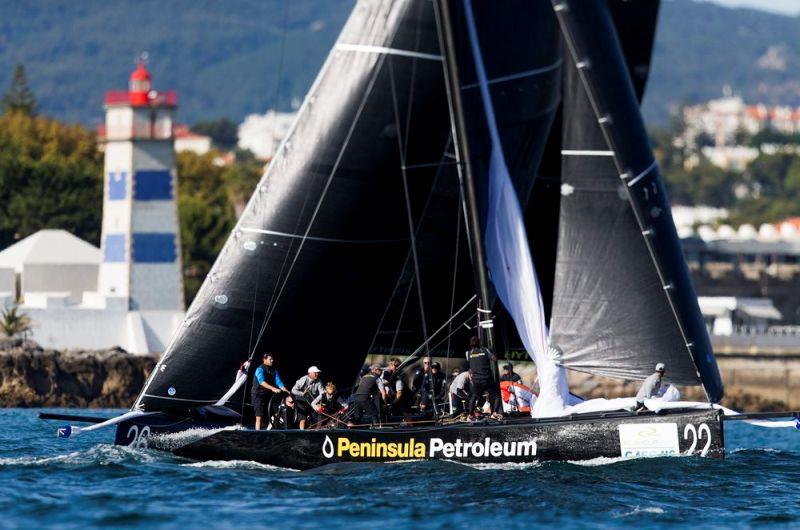 Fleet raceing in Cascais off the Santa Marta Lighthouse - photo © Pedro Martinez / Martinez Studio