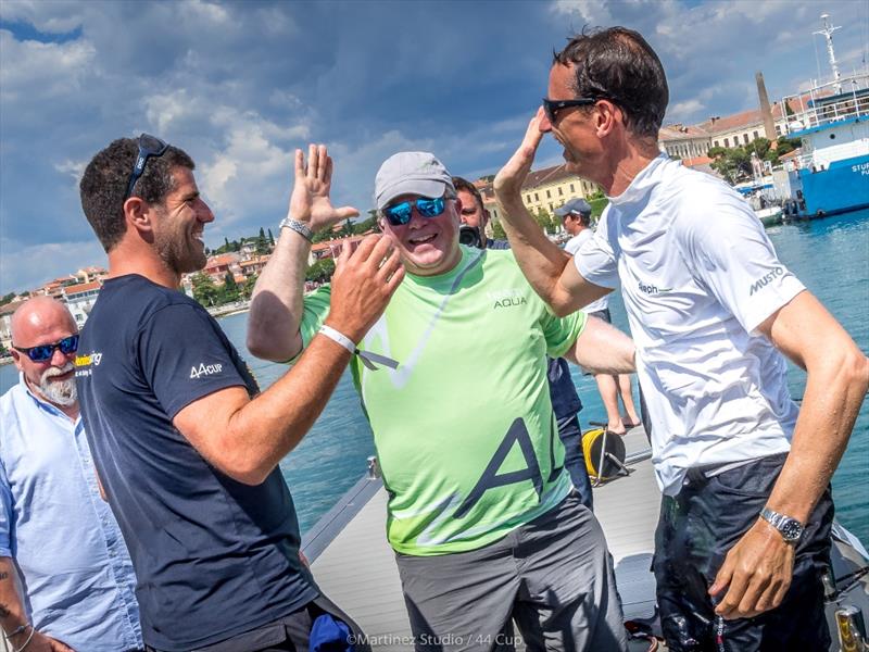 Peninsula Petroleum's John Bassadone (left) and Team Aqua's Chris Bake (centre) congratulate Aleph Racing's Hugues Lepic - Adris 44Cup Rovinj photo copyright Nico Martinez / www.MartinezStudio.es taken at  and featuring the RC44 class