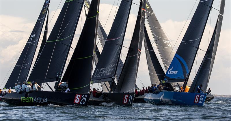 Team Aqua, CEEREF and Bronenosec Sailing Team stacked up coming into the top mark in today's first race - 44Cup World Championship photo copyright Pedro Martinez / Martinez Studio taken at  and featuring the RC44 class