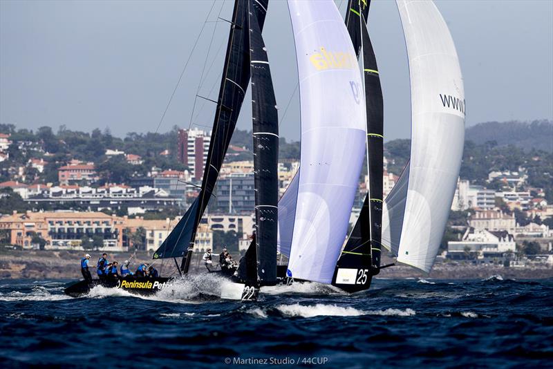 John Bassadone's Peninsula Petroleum jockeys with Team Aqua - 44Cup Cascais photo copyright Pedro Martinez / Martinez Studio taken at Porto Montenegro Yacht Club and featuring the RC44 class