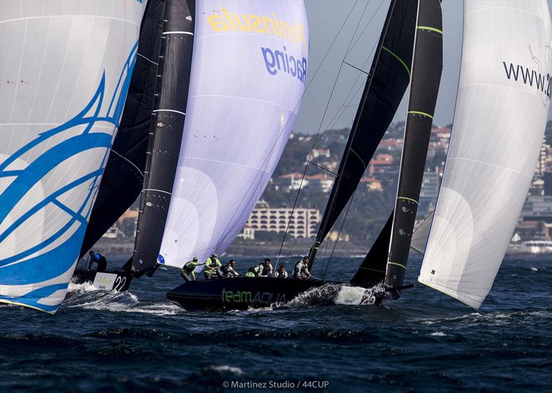 Team Aqua leads Peninsula Petroleum and Bronenosec Sailing Team down the run - 44Cup Cascais - photo © Pedro Martinez / Martinez Studio