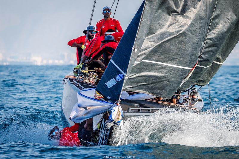 In an impressive display, the Omani crew on Team Asyad Racing had just pulled into the lead when their bowman fell overboard on day 3 of 44Cup Oman photo copyright Martinez Studio taken at Oman Sail and featuring the RC44 class